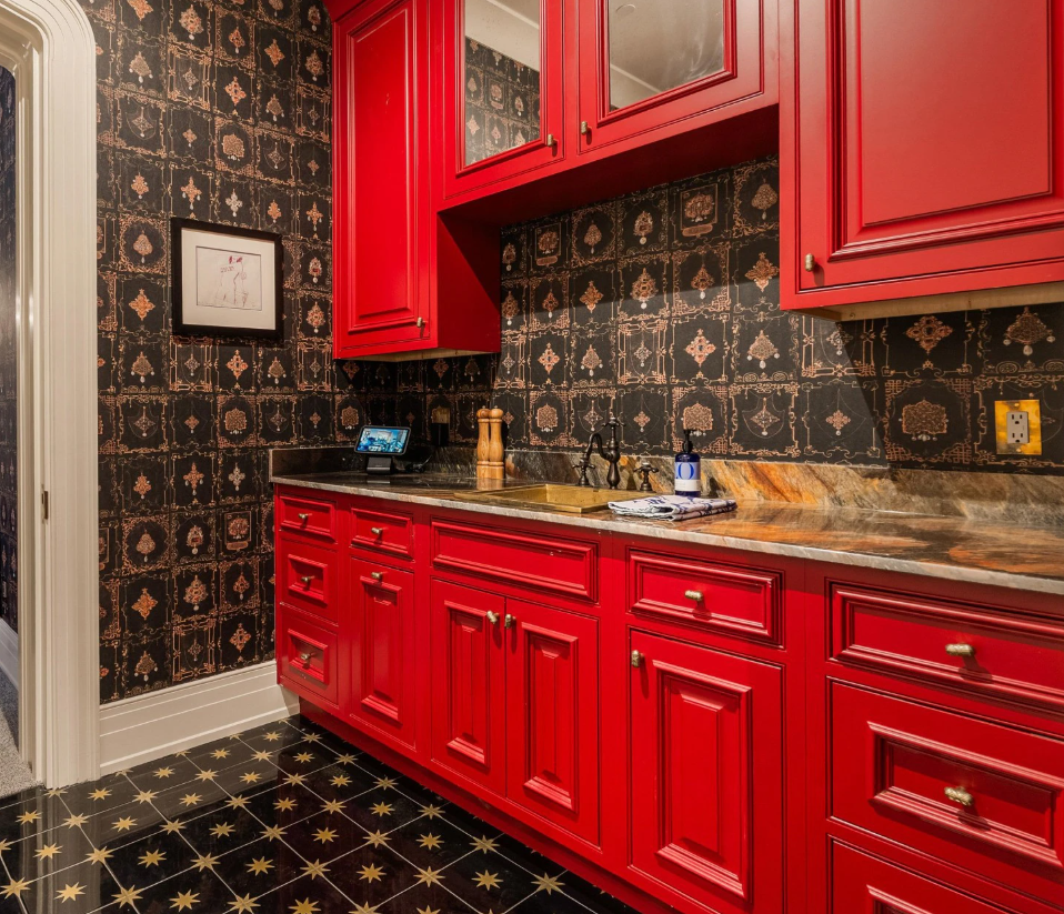Image of bar room with red Gracious Home custom cabinets with countertop and sink.